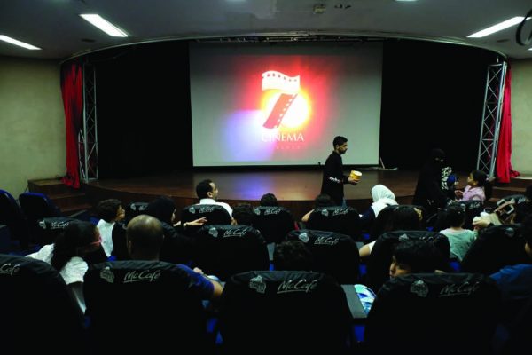 People  are seen inside the first Saudi Arabia cinema in Jeddah