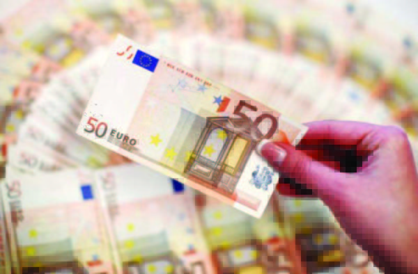 FILE PHOTO:An employee shows fifty-euro notes in a bank in Sarajevo